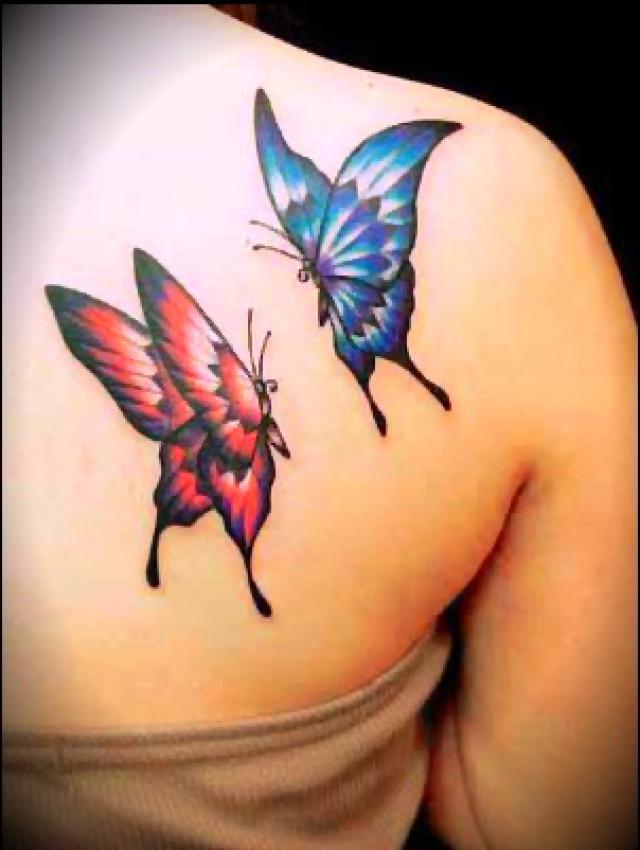 Red And Blue Butterflies Tattoo On Back Shoulder