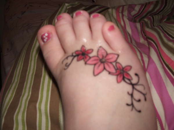 Red And Pink Flowers Foot Tattoo For Girls