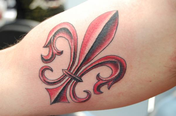 Red Fleur De Lis Tattoo On Biceps