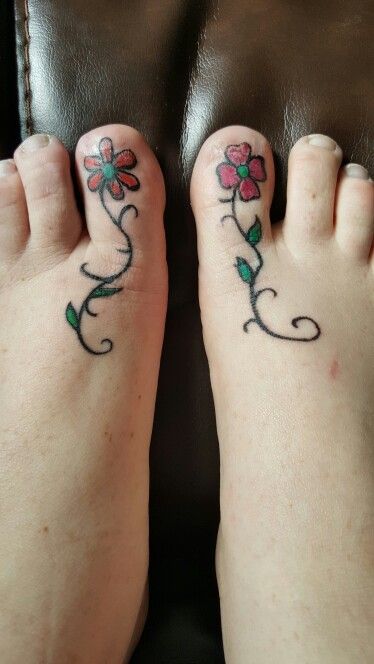 Red Flower Matching Tattoos On Big Toes