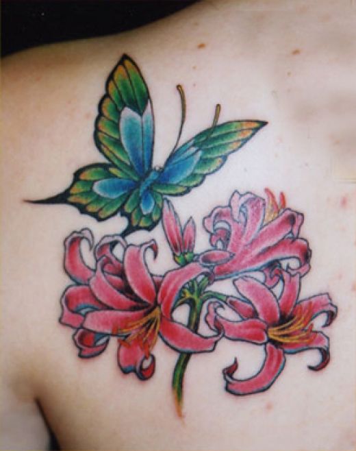 Red Flowers With Butterfly Tattoo On Back Shoulder