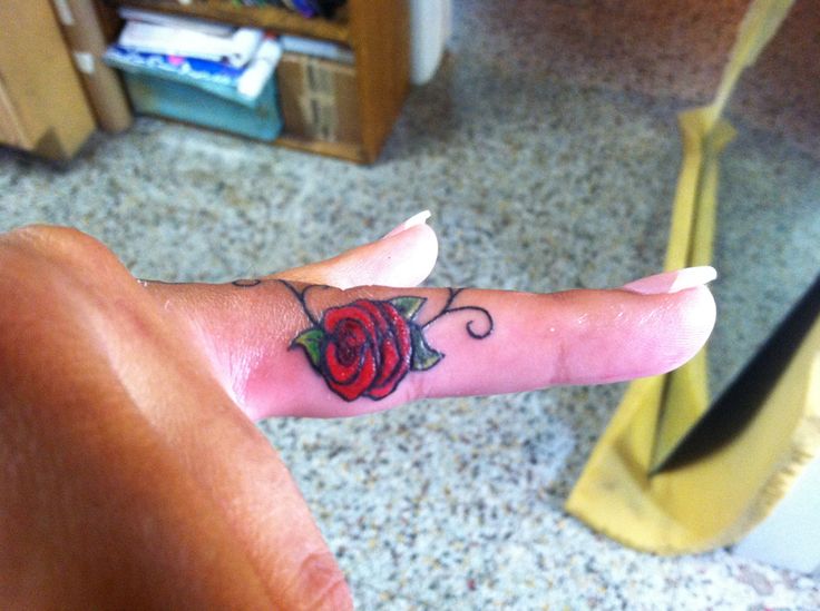 Red Rose Tattoo On Girl Side Finger