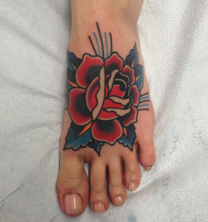 Red Rose Traditional Tattoo On Foot