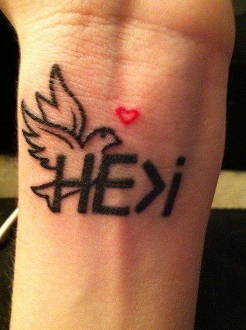 Religious Bird Heart Tattoo On Wrist For Men