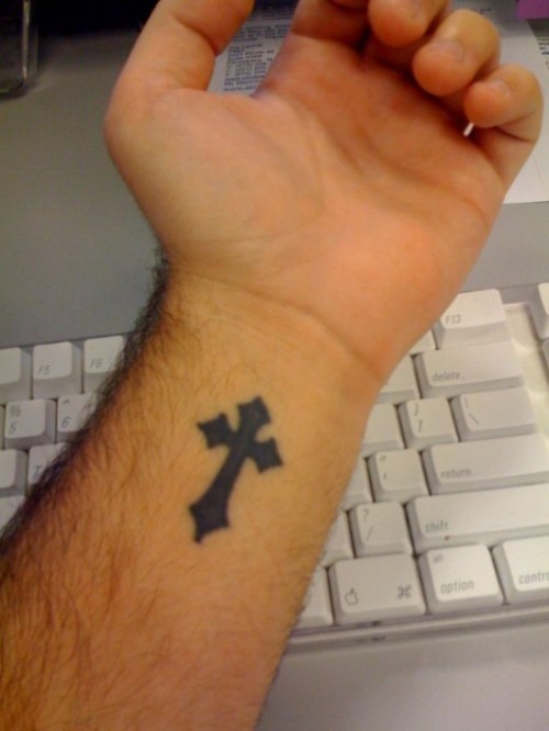 Religious Cross Tattoo On Man Wrist