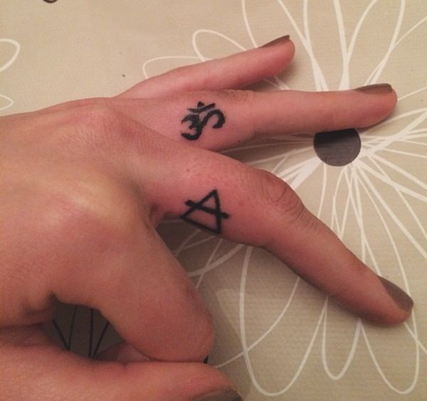 Religious Finger Tattoo For Girls