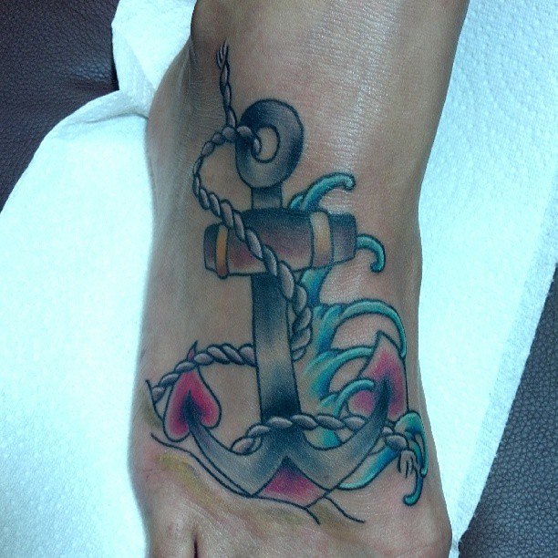 Rope Anchor And Waves Traditional Tattoo On Foot