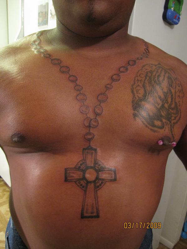 Rosary Beads With Cross Tattoo On Chest By Underground