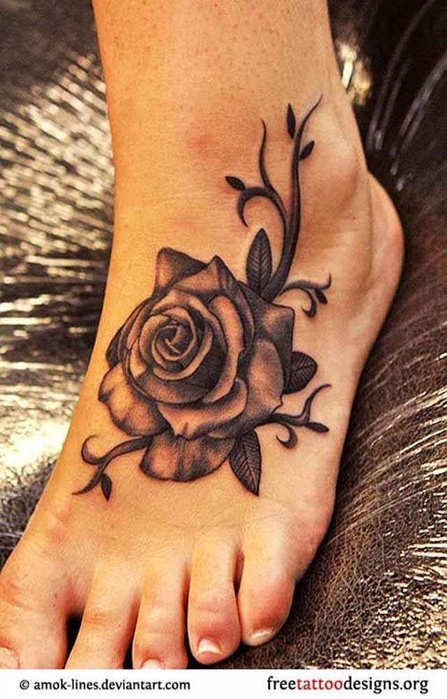 Rose Black And White Flower Tattoo On Foot