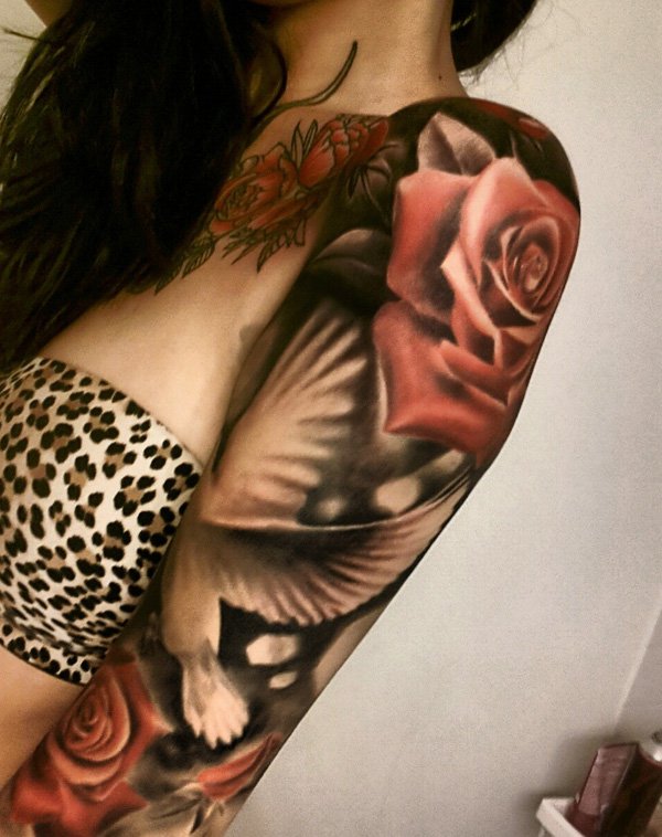 Rose Flowers And Flying Dove Tattoo On Left Half Sleeve