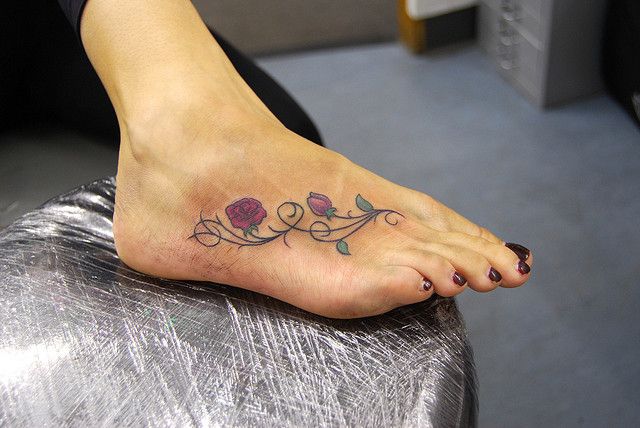 Roses Vine Tattoo On Foot For Girls