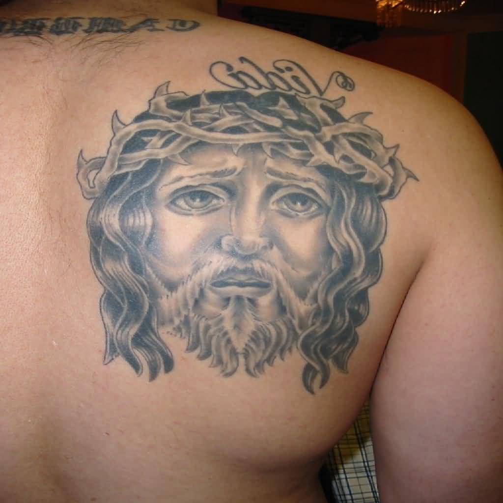 Sad Jesus Face Christian Tattoo On Back Shoulder