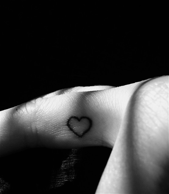 Side Finger Outline Heart Tattoo