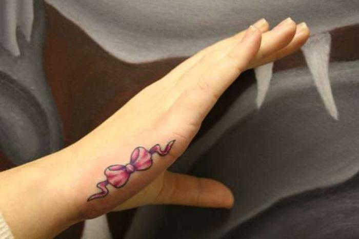 Side Hand Bow Tattoo For Girls