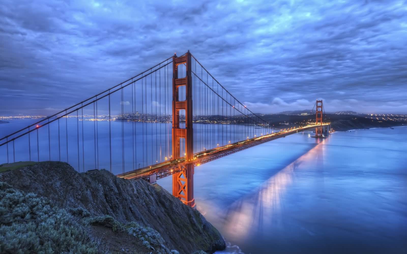 Side View Of Golden Gate Bridge At Dusk