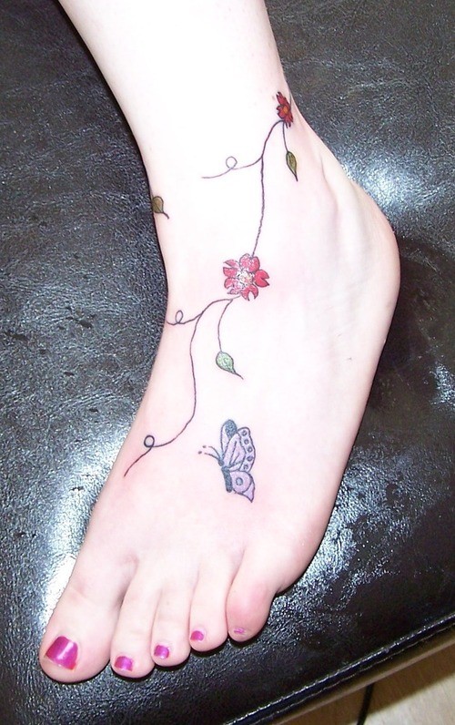 Simple Butterfly And Flowers Tattoo On Foot
