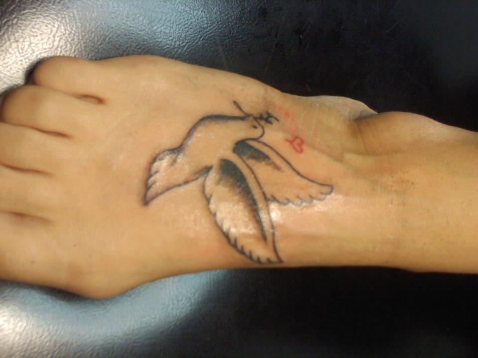 Simple Dove Right Foot Tattoo