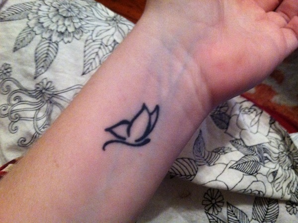 Simple Flying Butterfly Tattoo On Wrist