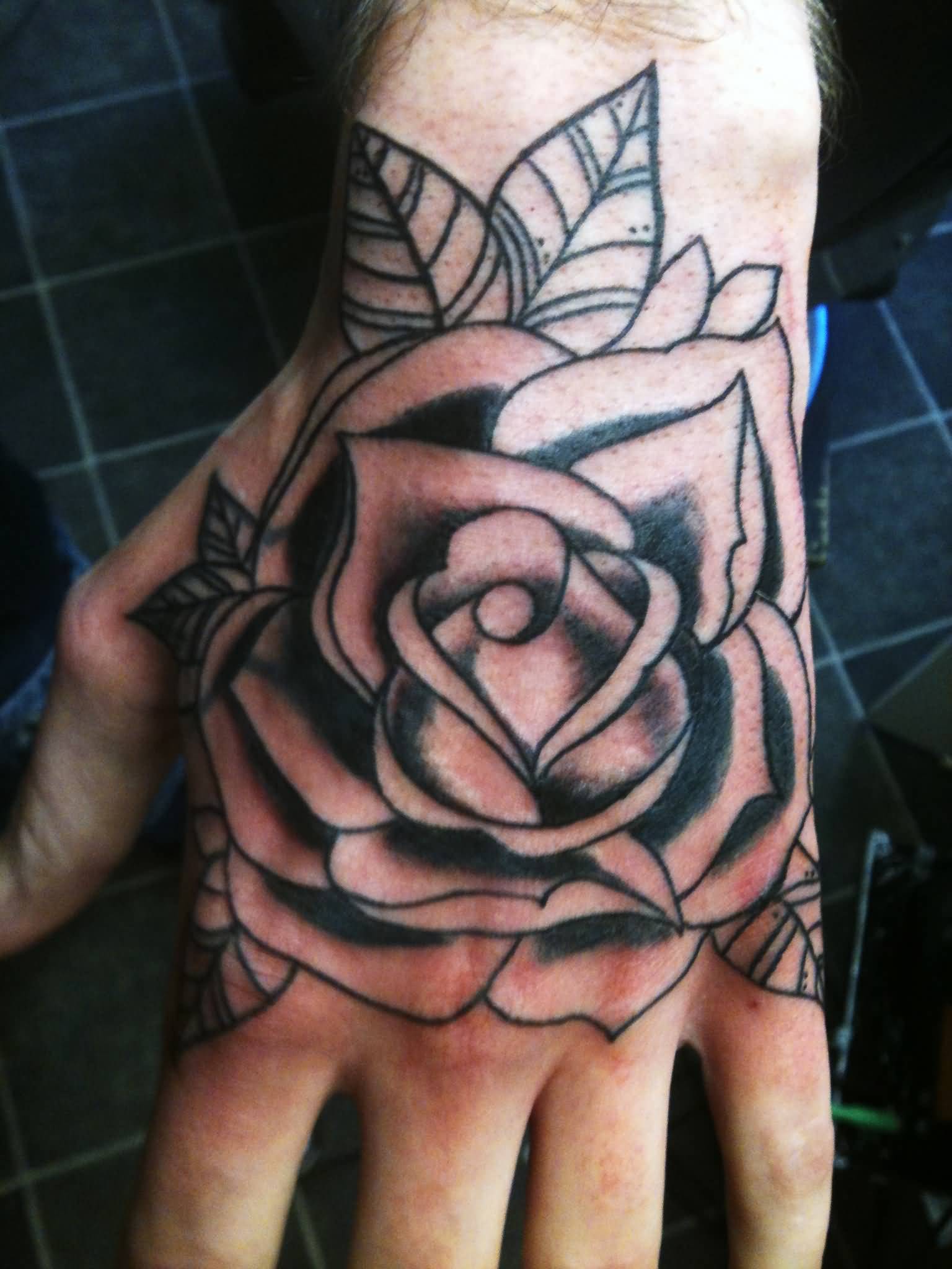 Simple Grey Rose Tattoo On Hand For Men