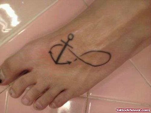Simple Infinity Anchor Tattoo On Foot