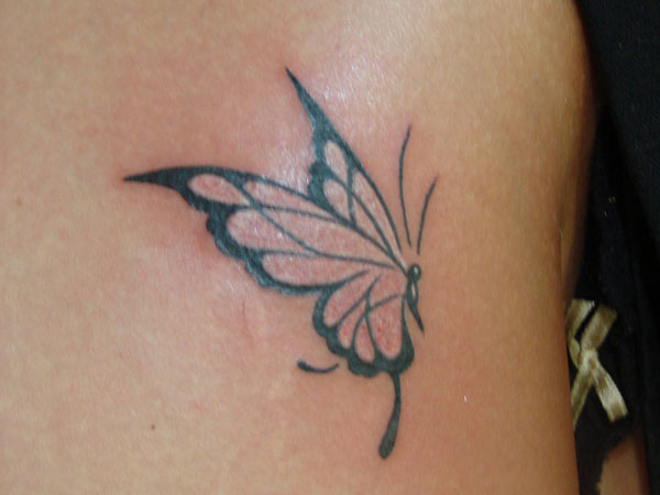 Simple Pink Butterfly Tattoo