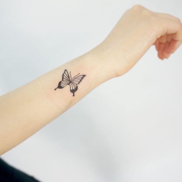 Simple Small Butterfly Tattoo On Wrist For Girls