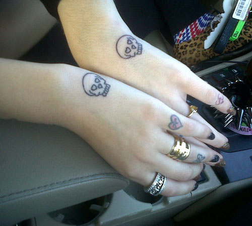 Simple Small Skull Matching Side Hand Tattoos For Girls