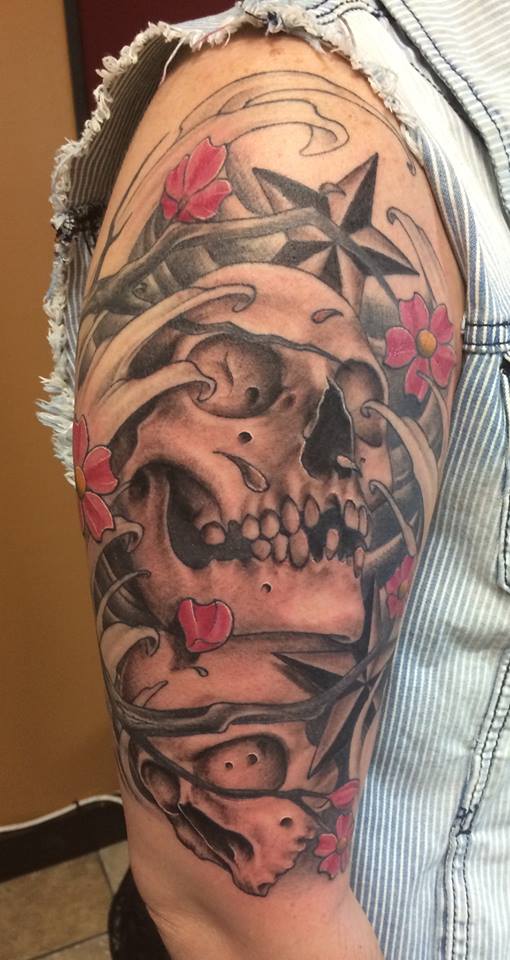 Skull Tattoo On Right Half Sleeve by Eric Noble