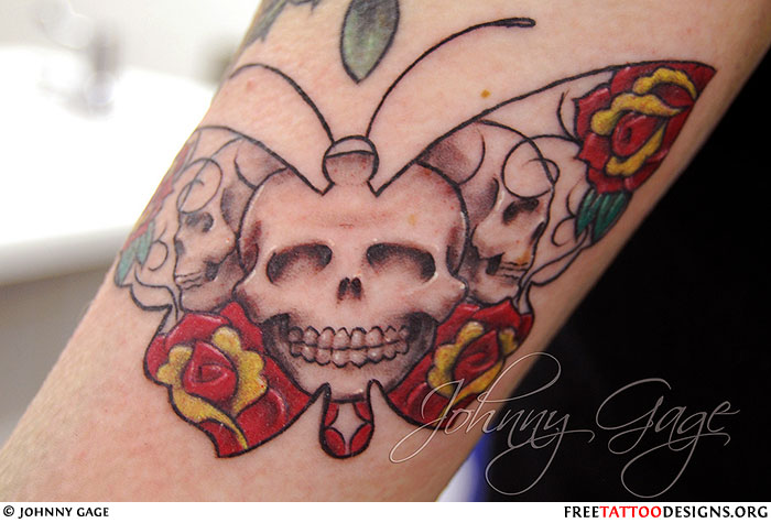 Skulls Butterfly Tattoo On Arm