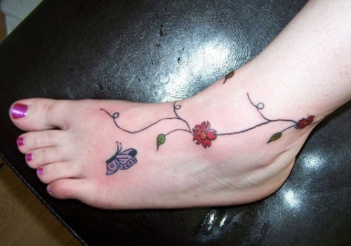 Small Butterfly And Flowers Girl Foot Tattoo