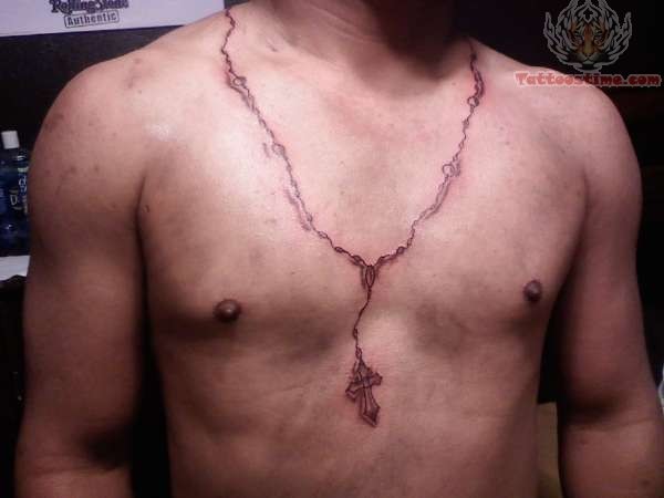 Small Cross Rosary Tattoo On Chest For Men