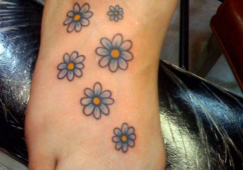 Small Daisy Flowers Tattoo On Foot
