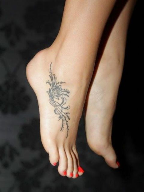 Small Flower Tattoo On Right Foot