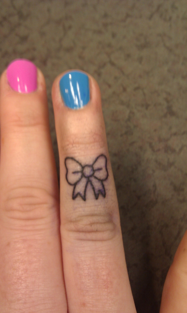 Small Girly Finger Bow Tattoo