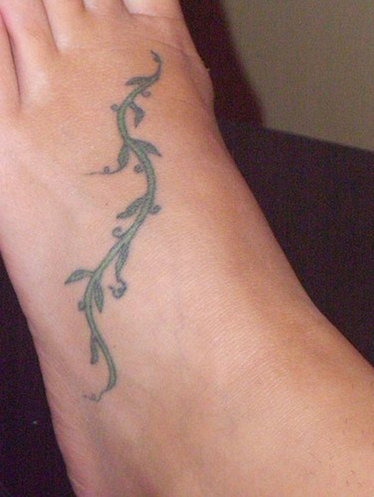 Small Green Vine Tattoo On Foot