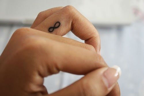 Small Infinity Inner Finger Tattoo For Girls