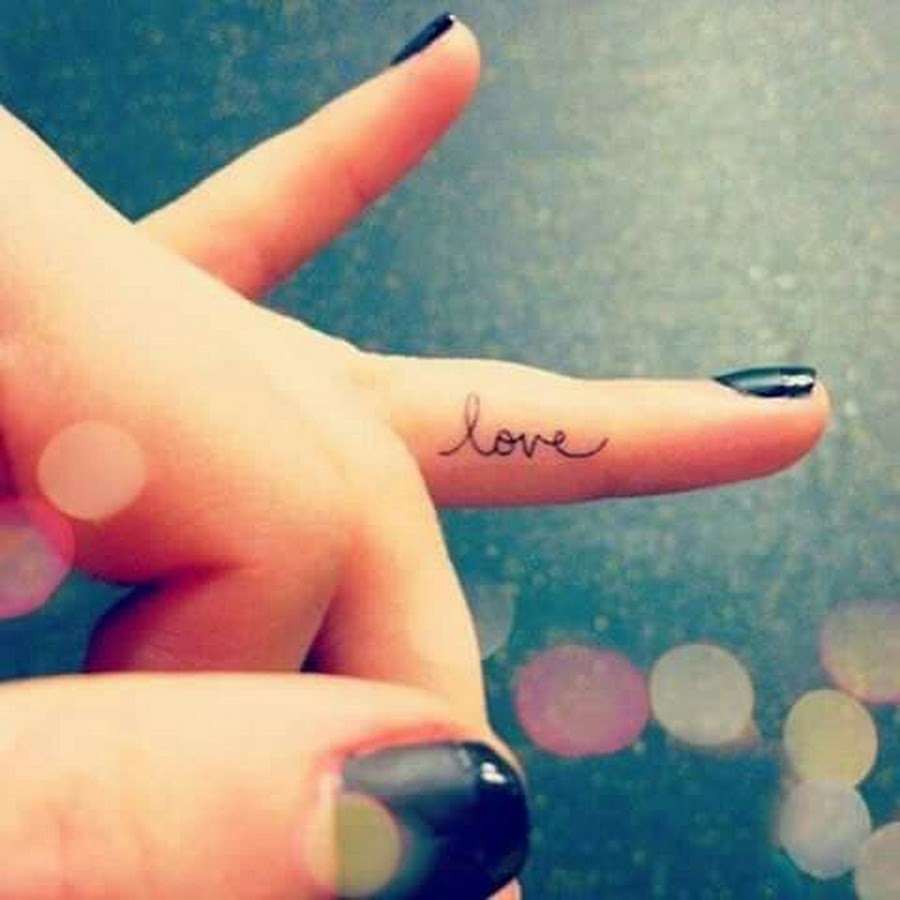 Small Love Word Tattoo On Girls Finger