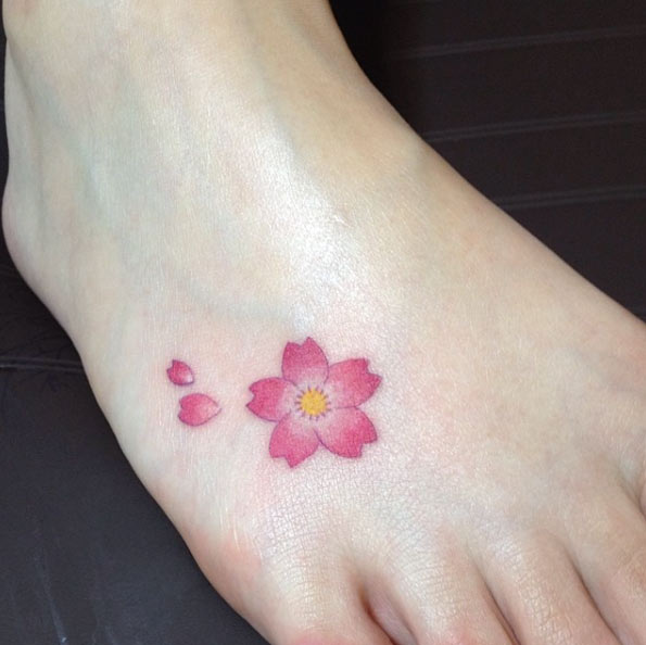 Small Pink Flower Tattoo On foot By Graffittoo