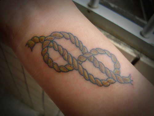 Small Rope Knot Tattoo On Wrist