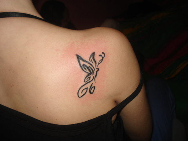 Small Tribal Butterfly Tattoo On Back Shoulder For Girls