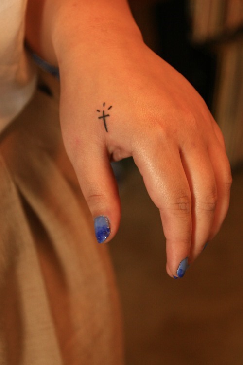 Smallest Cross Tattoo On Girl Side Hand
