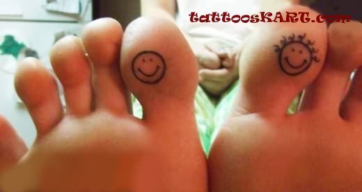 Smiley Tattoos On Bottom Of Toe