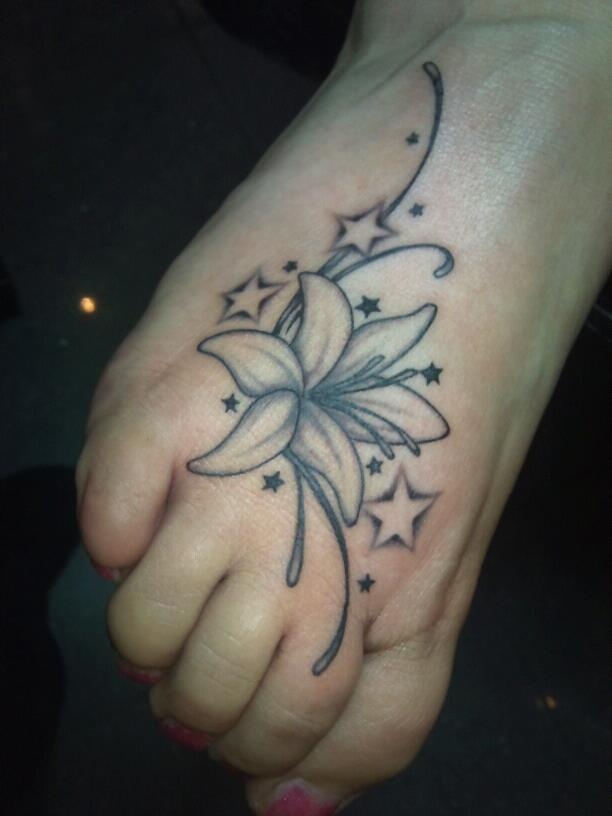 Stars Lily Flower Tattoo On Foot For Women