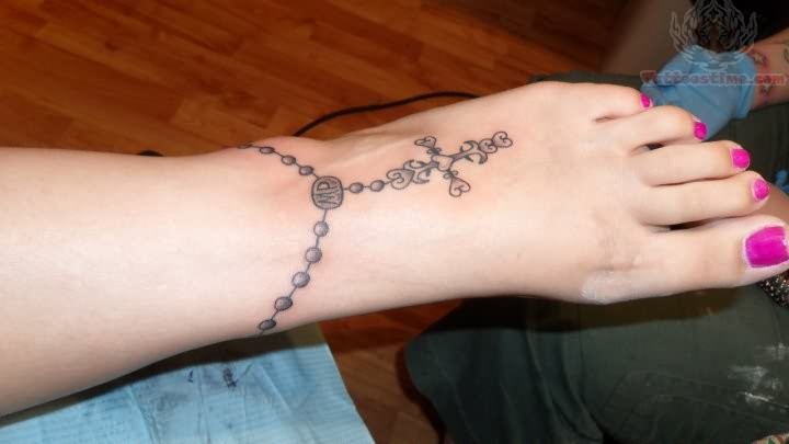 Stylish Cross Rosary Tattoo On Foot For Girls