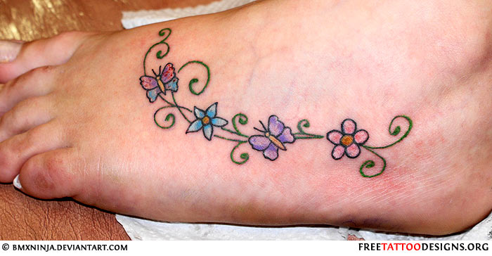Swirly Butterflies And Flowers Foot Tattoo