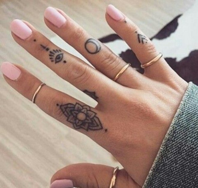 Symbol On Fingers Tattoo For Girls