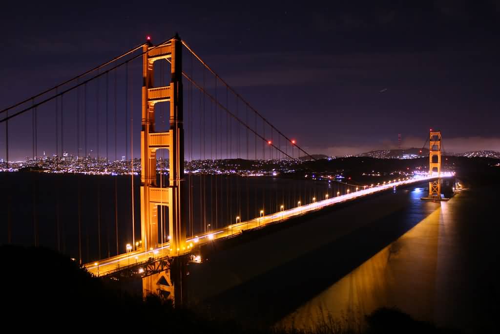 The Golden Gate Bridge Lit Up At Night In San Francisco