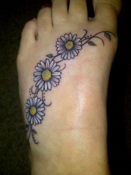 Three Daisy Flowers Tattoo On Left Foot
