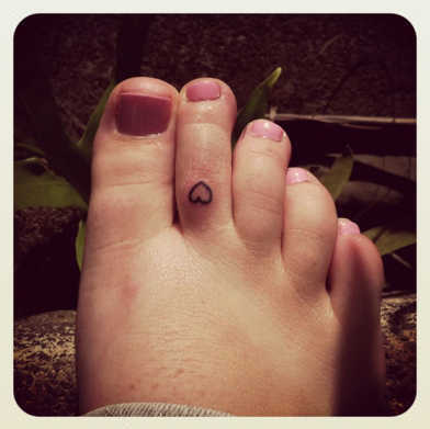 Tiny Heart Toe Tattoo On Girl Foot