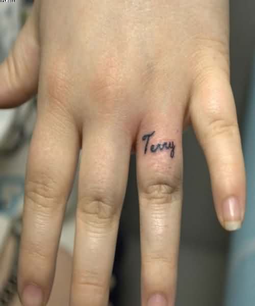 Tiny Name Word Tattoo On Finger
